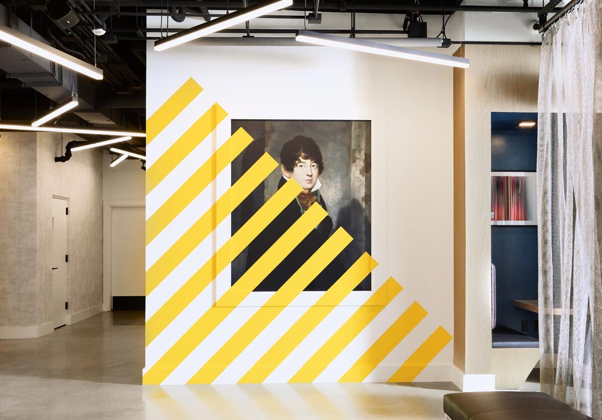 lobby with yellow stripes on wall