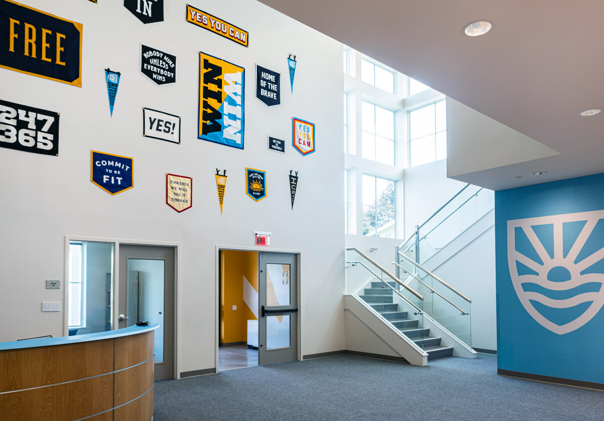 New fitness center lobby with inspirational banners
