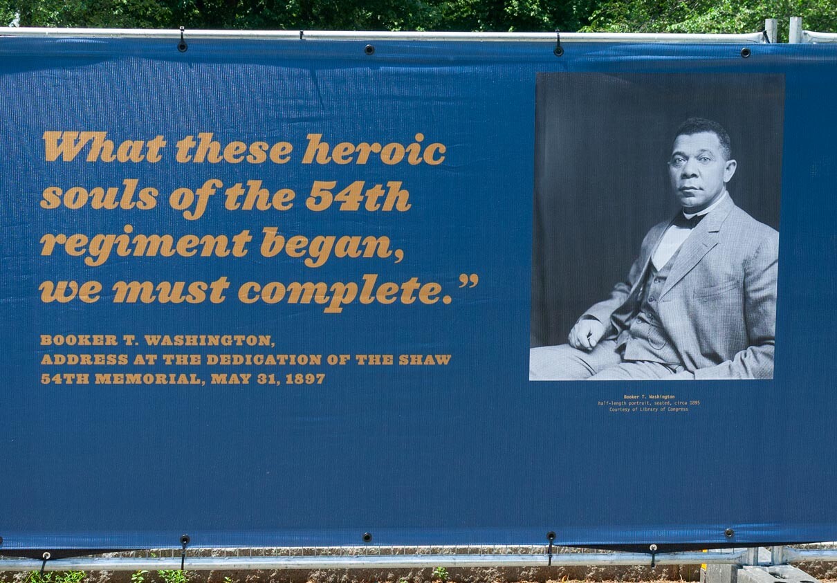 Booker T Washington quote on fence