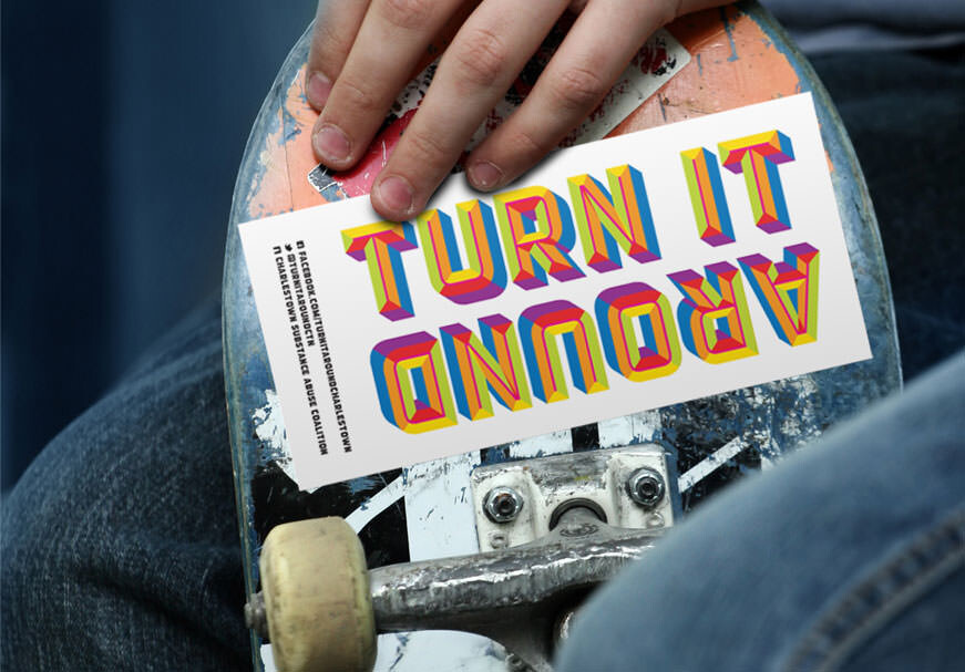 Turn It Around sticker on skateboard